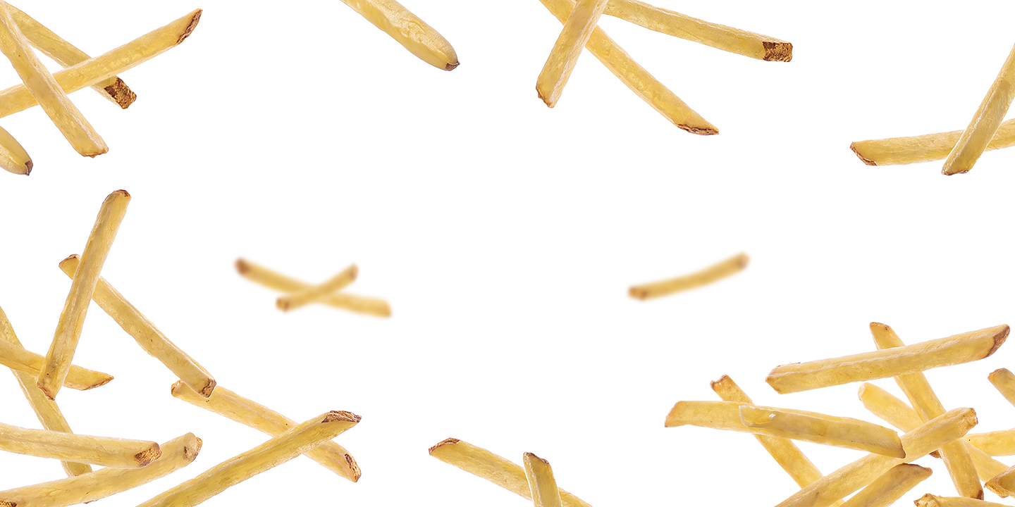 Thin allumette crisps scattered around the edges of the frame